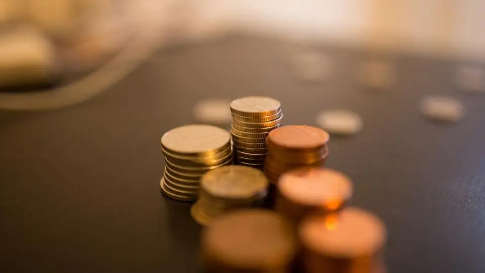 Currency slides after surprise trade deficit